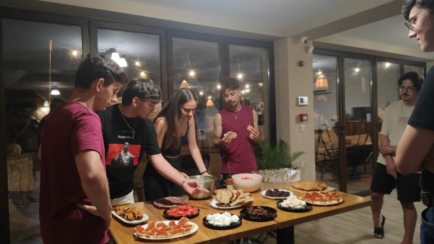 Participants sharing Bulgarian food at the cultural evening