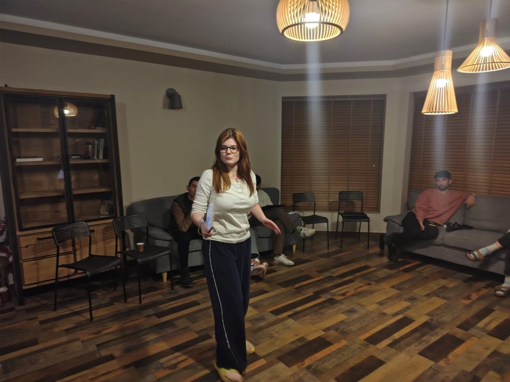 A participant presenting to the group