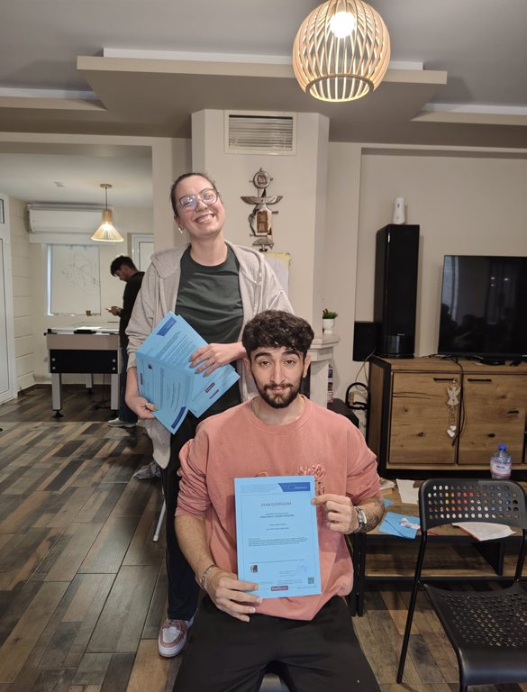 Participants holding their Youthpass certificates