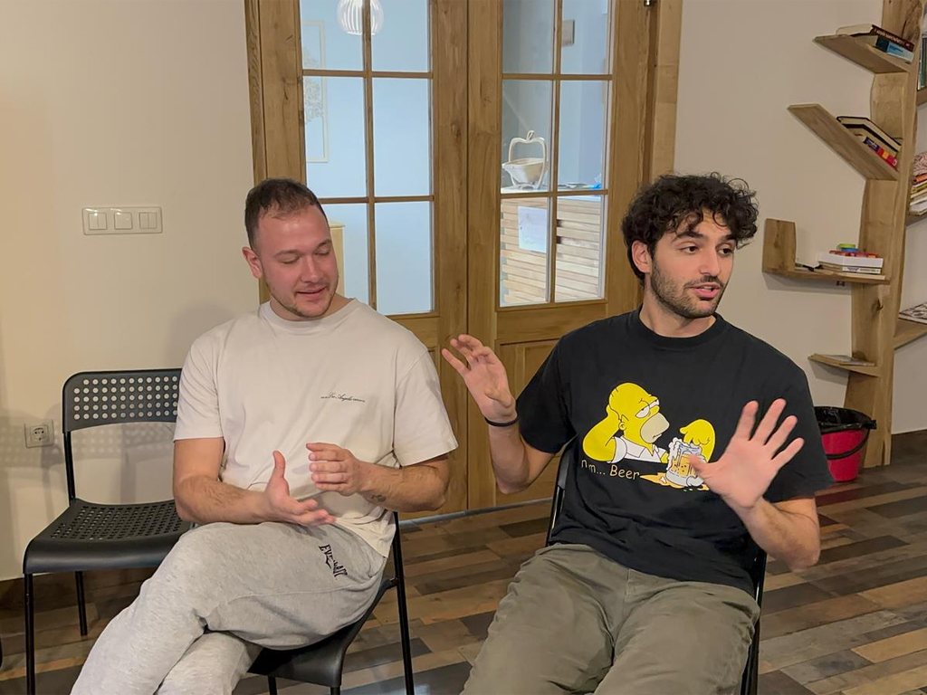 Two participants laughing during a session