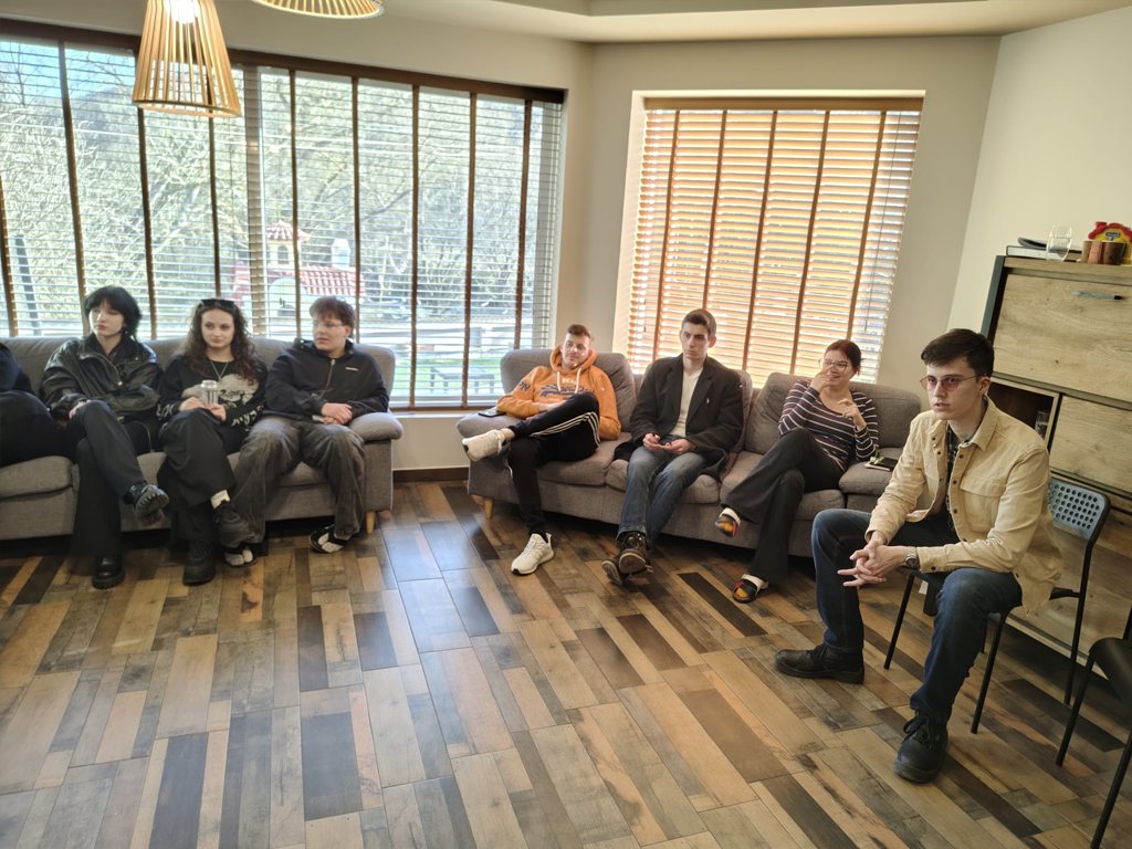 Participants seated around the training room