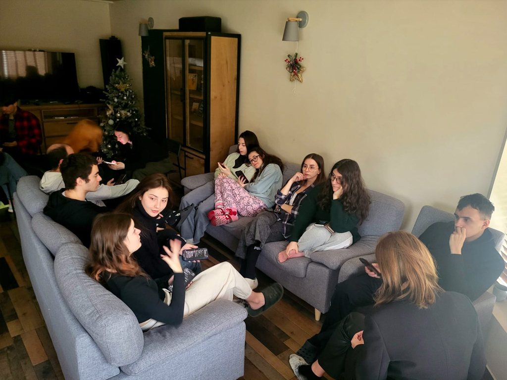 Participants relaxing on sofas