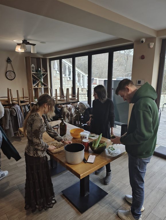 Participants cooking at a shared table