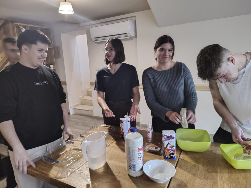 An international team cooking together