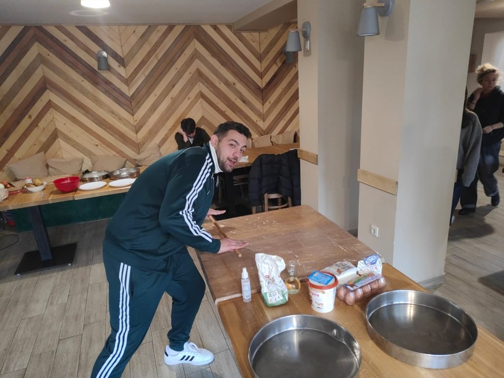 A participant setting up a cooking station