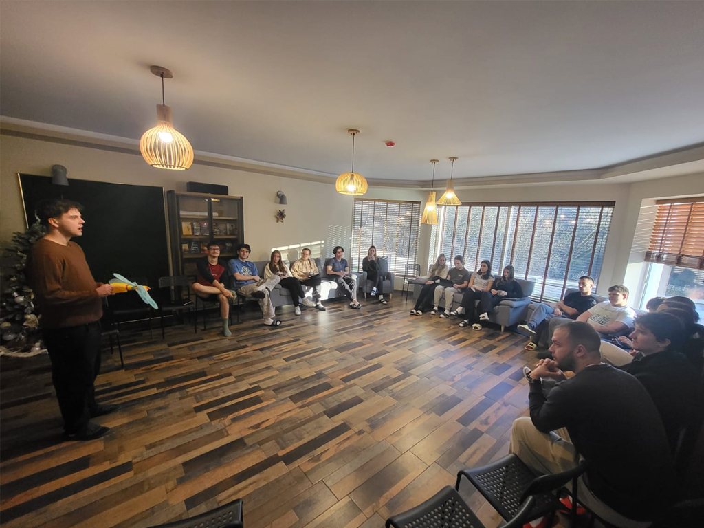 A participant speaking to the group