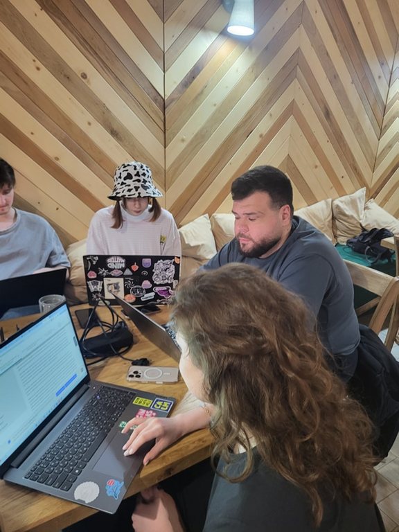 Participants working on laptops