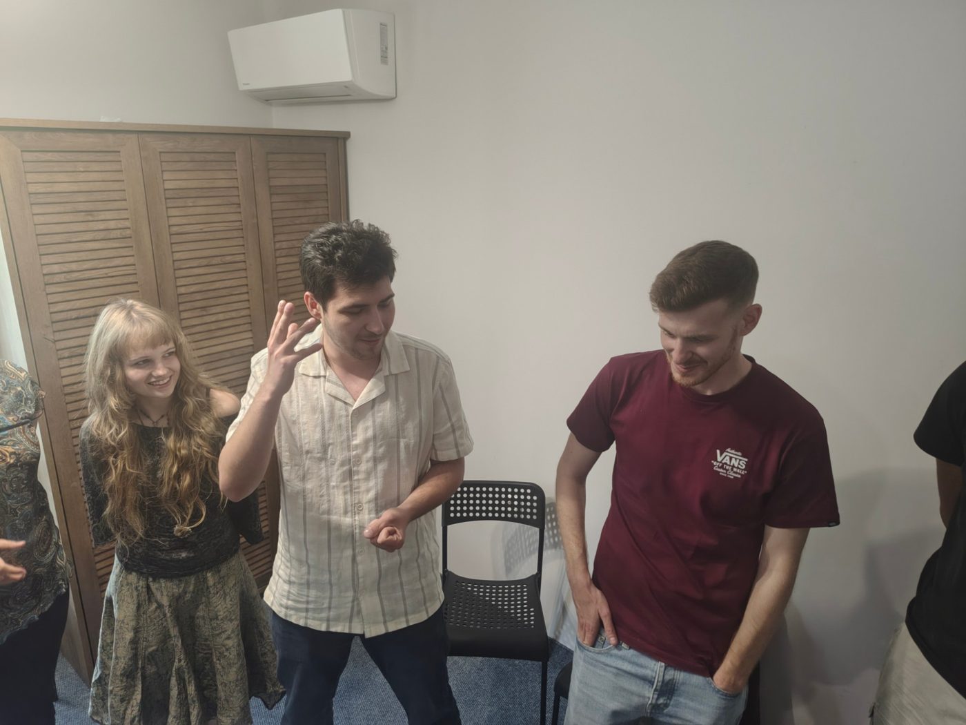 Participants laughing during a team-building game