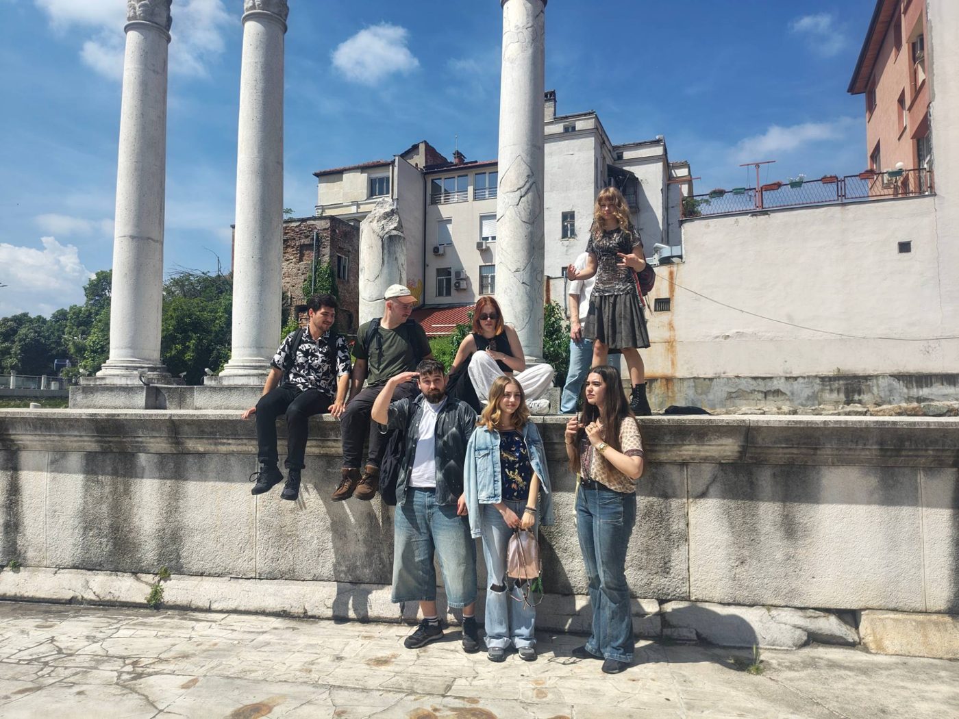Participants among the Roman columns during the field trip to Plovdiv