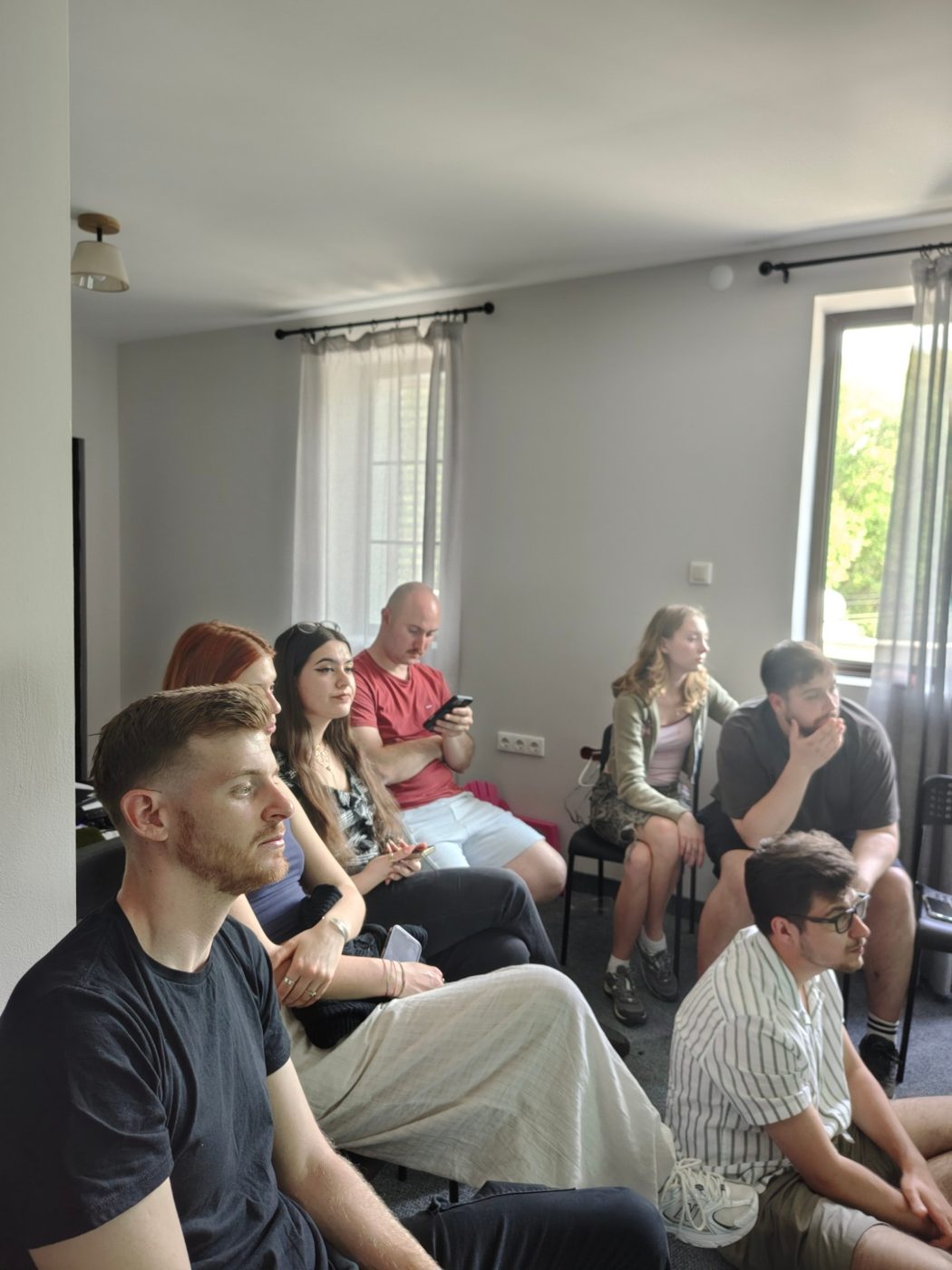 Participants listen closely during a session